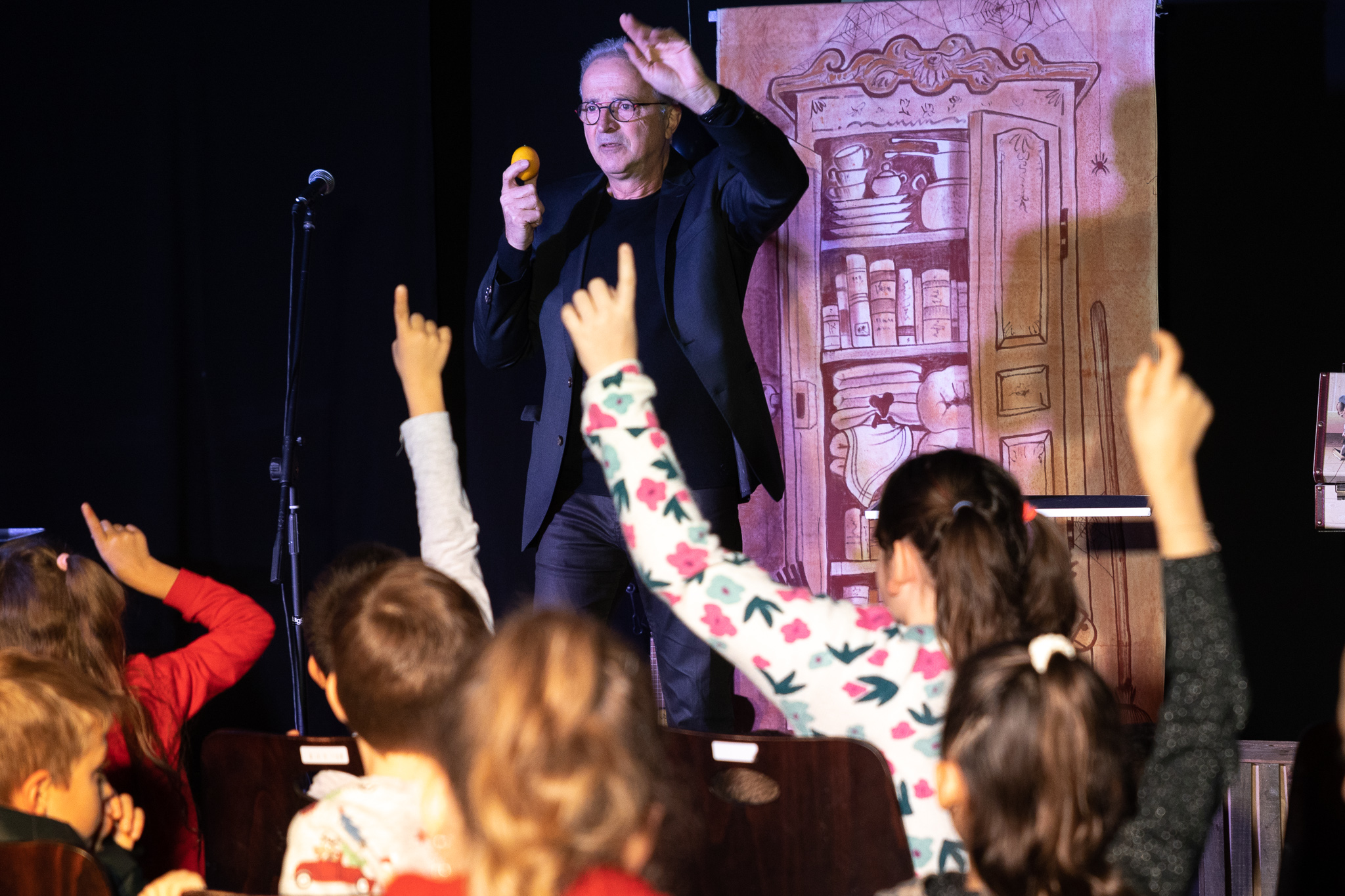 young man side profile having beard trimmed with scissors